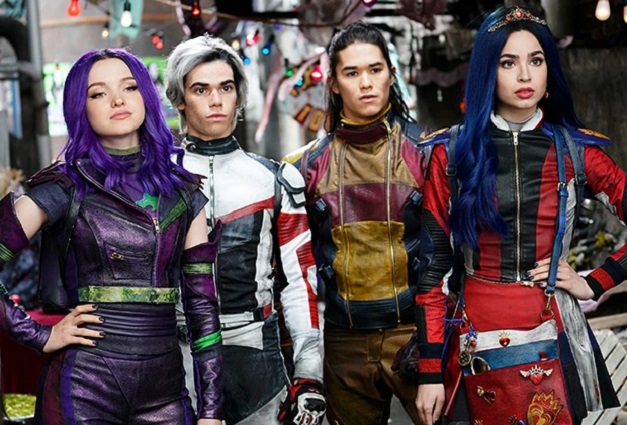 Maleficent's daughter Mal (Dove Cameron), Cruella de Vil's son Carlos (Cameron Boyce), Jafar's son Jay (Booboo Stewart), and the Evil Queen's daughter Evie (Sofia Carson) in Descendants.