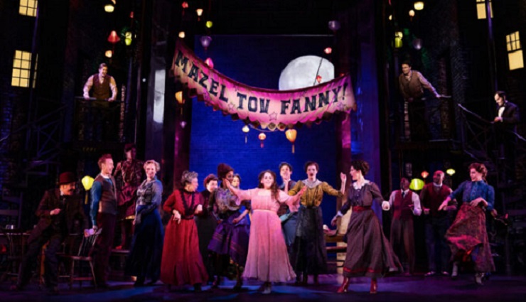 This image released by Polk & Co. shows Beanie Feldstein, center, with the cast during a performance of "Funny Girl." (Matthew Murphy/Polk & Co. via AP)